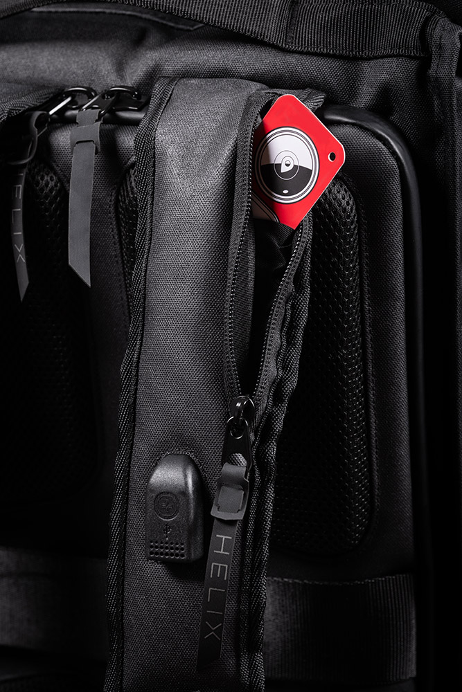 Close-up view of the tracking device pocket of the Helix Stadium Backpack