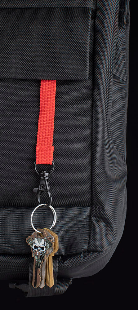 Close-up of key holder on the HX Messenger Bag