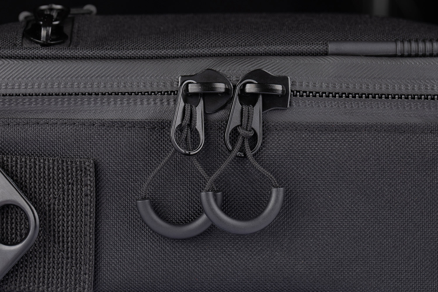 Close-up of zipper openers for POD Go and POD Go Wireless Shoulder Bag