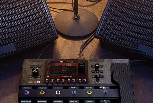 cut up image with bottom part of stage monitor, top part of Helix Stadium XL Floor and microphone stand