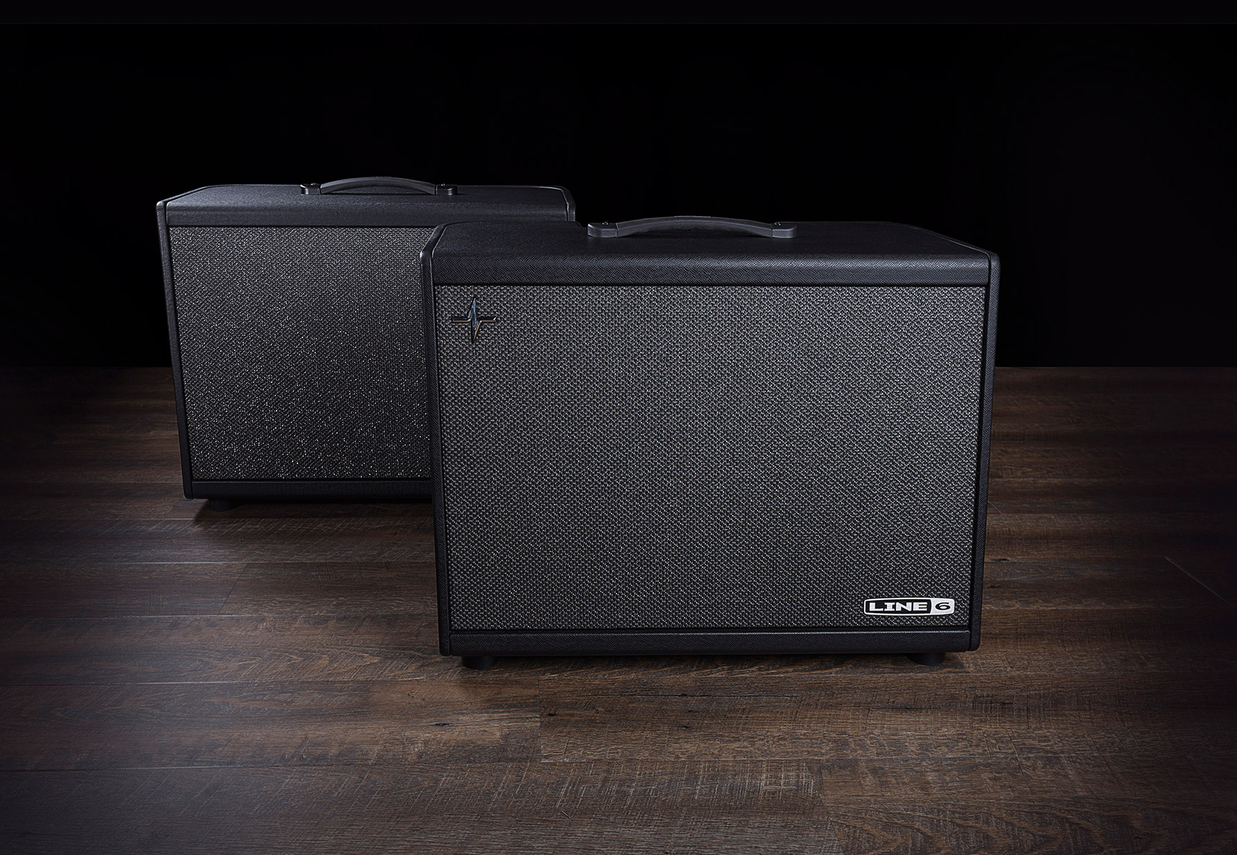 Powercab 112 Plus staggered in front of Powercab 112 on wood floor