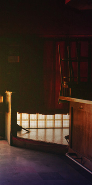 Part 3 cut up image with small stage and bar