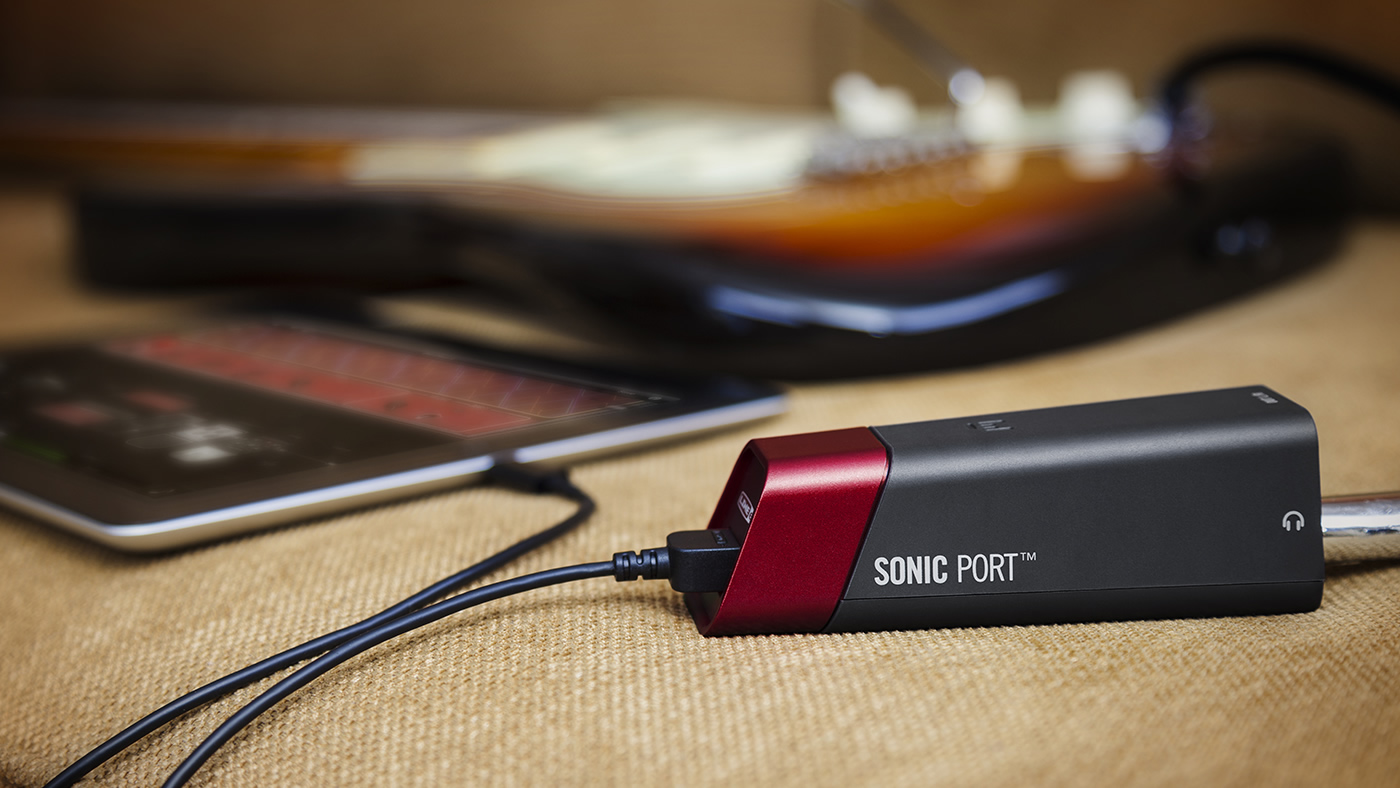 Line 6 Sonic Port guitar recording interface plugged into an iPad